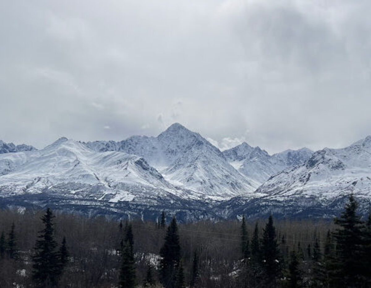 Calm Alaska mountain lake, a picture of finding peace in a heavy season